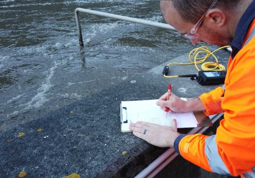 Wastewater Process Engineer Onsite Taking Measurements